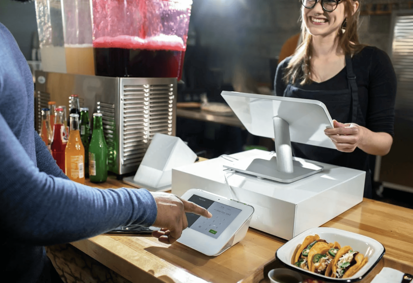 Clover Station Duo POS System and people