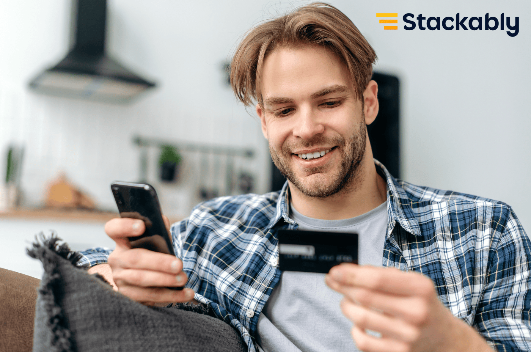 Man with credit card and smartphone