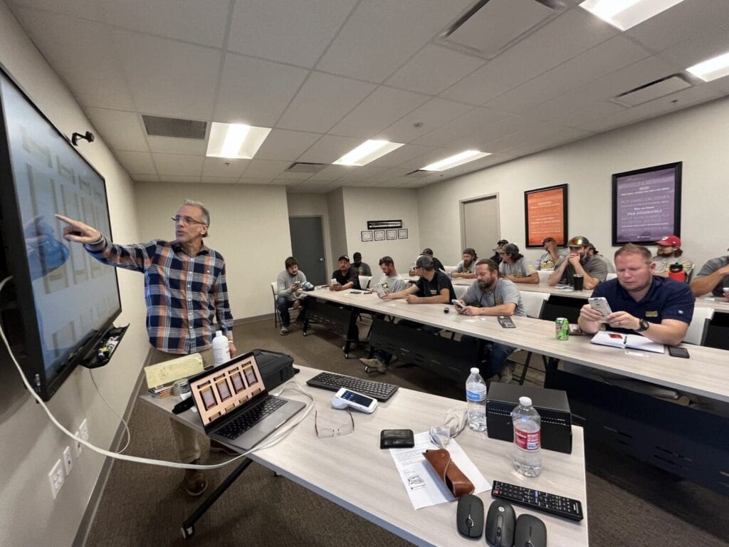 Greg G Kapitan teaching Team Members