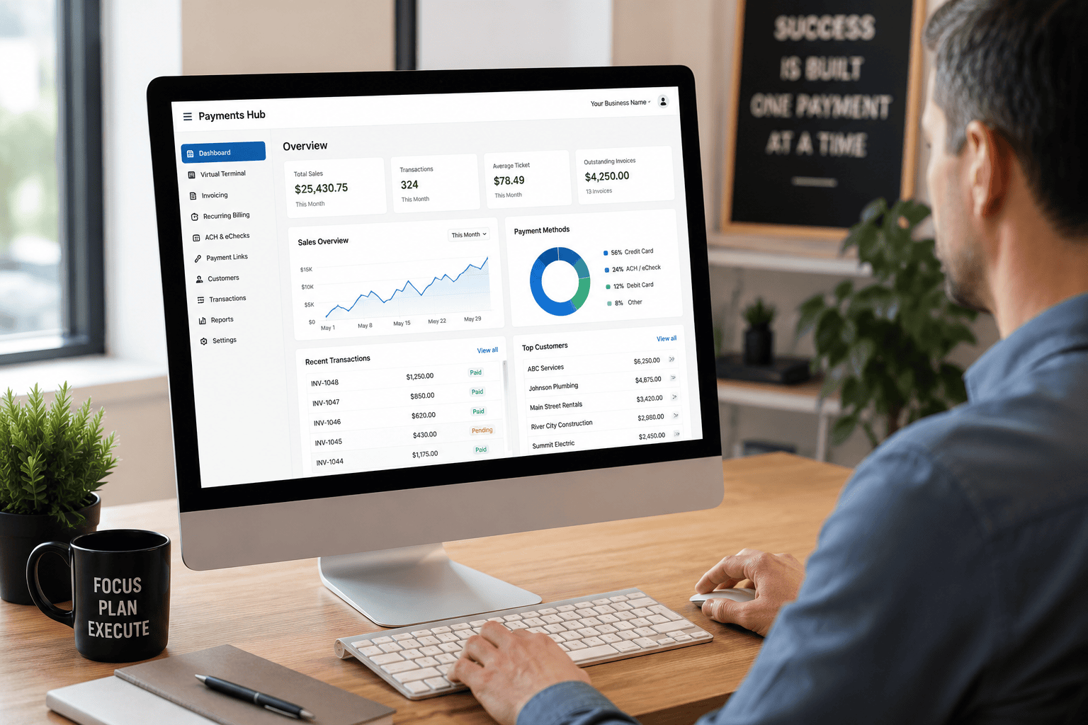 Image of Payments Hub user at a desktop computer