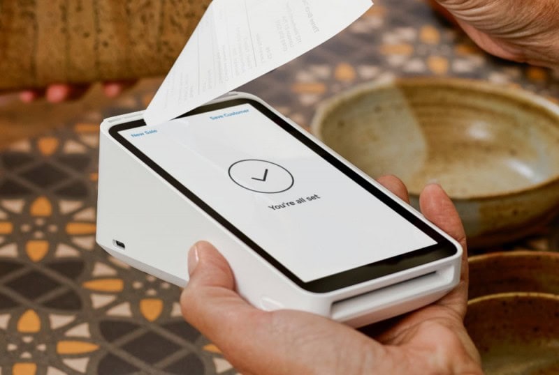 image of paper receipt with square terminal