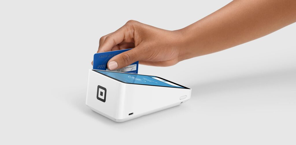 image of square terminal with credit card